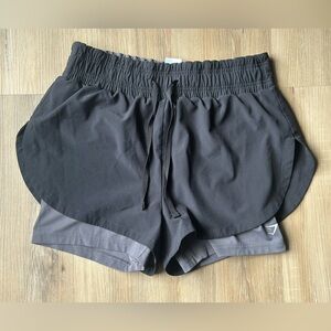 Gymshark Women's Black Double-Layer Athletic Shorts with Gray Liner